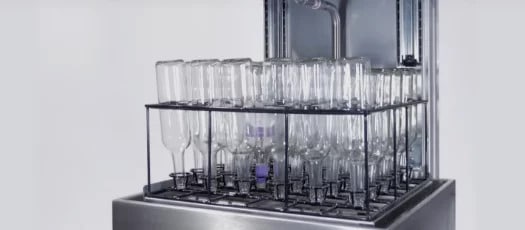 Transparent clean sparkling bottle washer