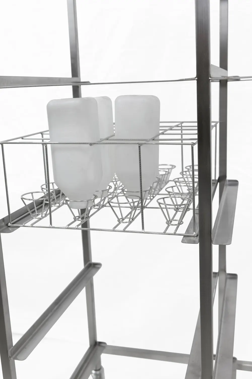 Stainless steel basket cart on casters, with rails for washing baskets